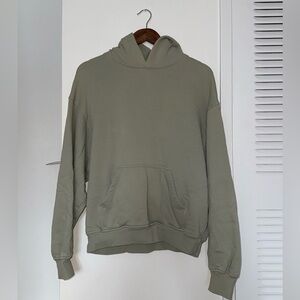 Aritzia TNA CozyAF Fleece Mega Hoodie.